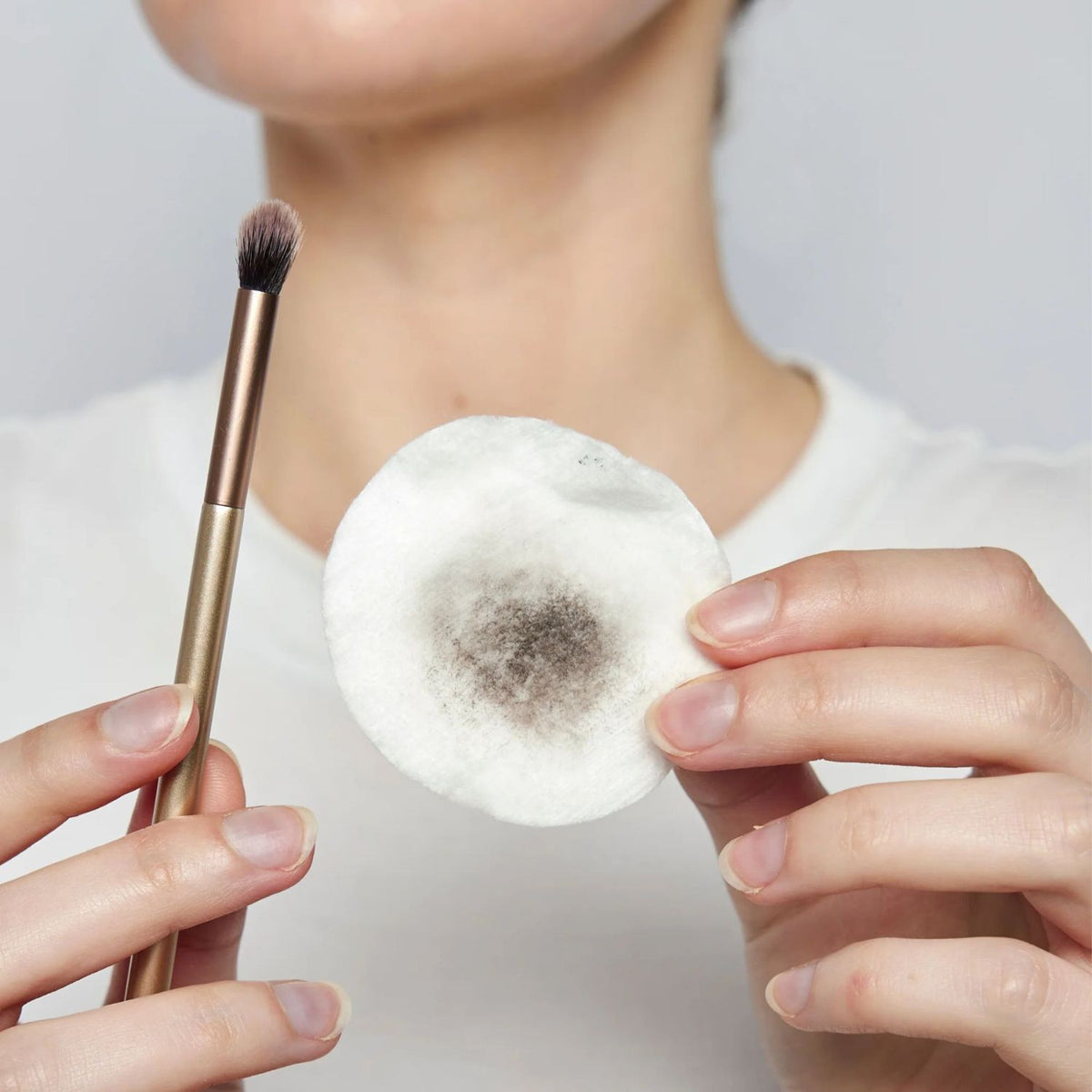 Cotton pad that just removed built up makeup from brush.
