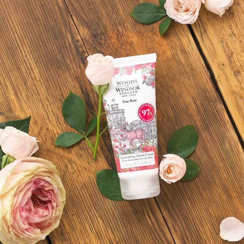 Flatlay with Englsih roses and a scent hand cream.