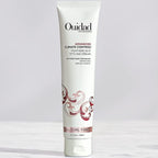 Ouidad Advanced Climate Control Featherlight Styling Cream tube on a white background