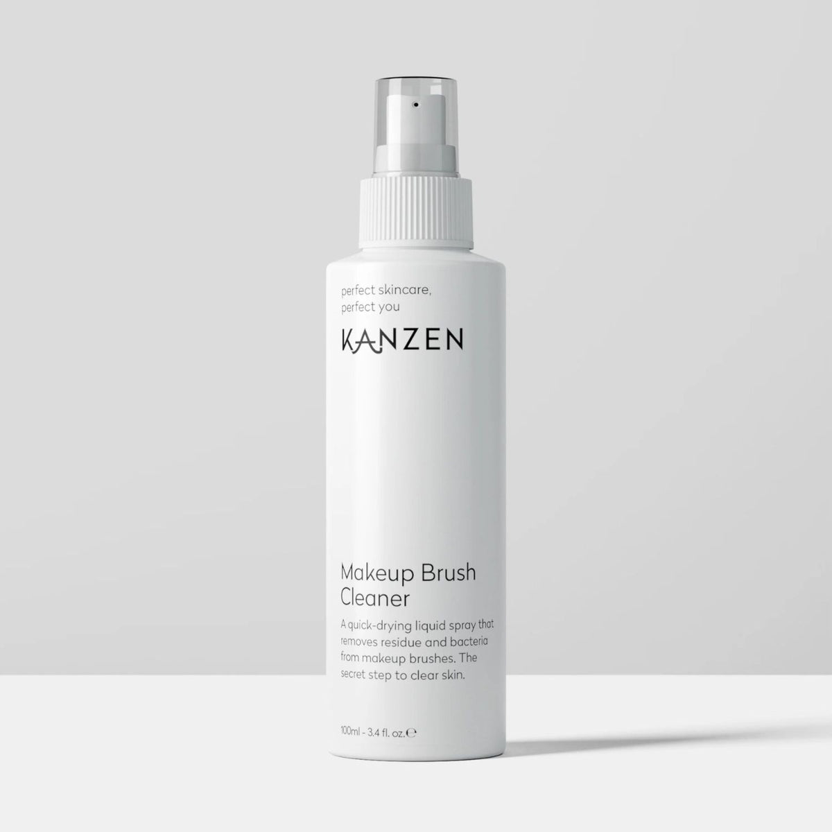 Spray bottle for liquid that removes residue and bacteria from makeup brushes.