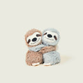 Small brown and grey sloths hugging each other.