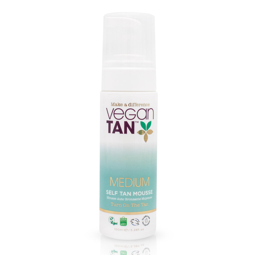 white bottled tanning product on white background