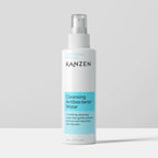 Small bottle of cleansing water, grey background.